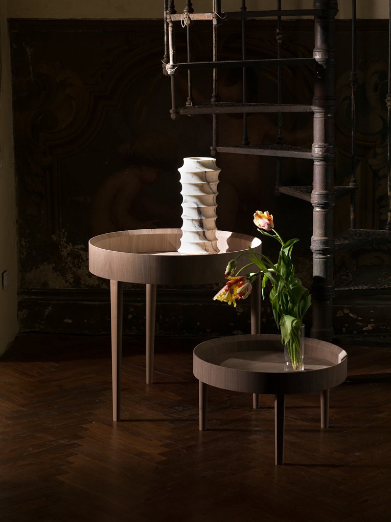 Two low tables and a few tulips.