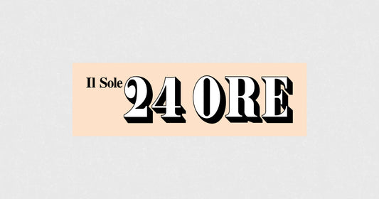 Il Sole 24 ORE logo with black and white text on a peach background