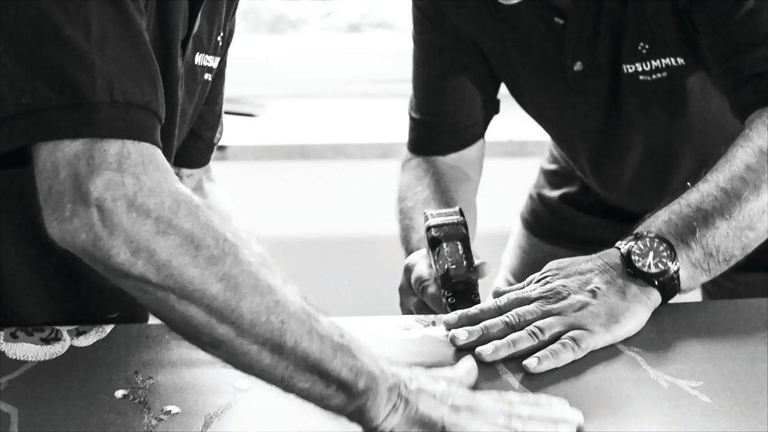 Artisans handcrafting a luxury mattress with natural materials in a workshop