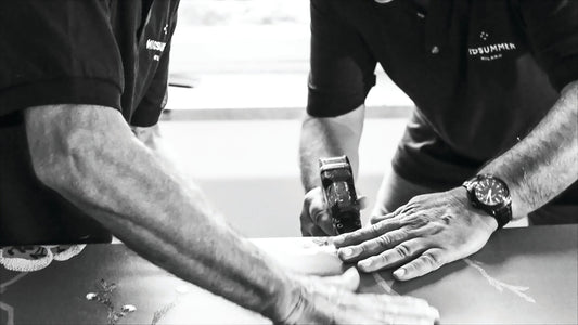 Artisans handcrafting a luxury mattress with natural materials in a workshop
