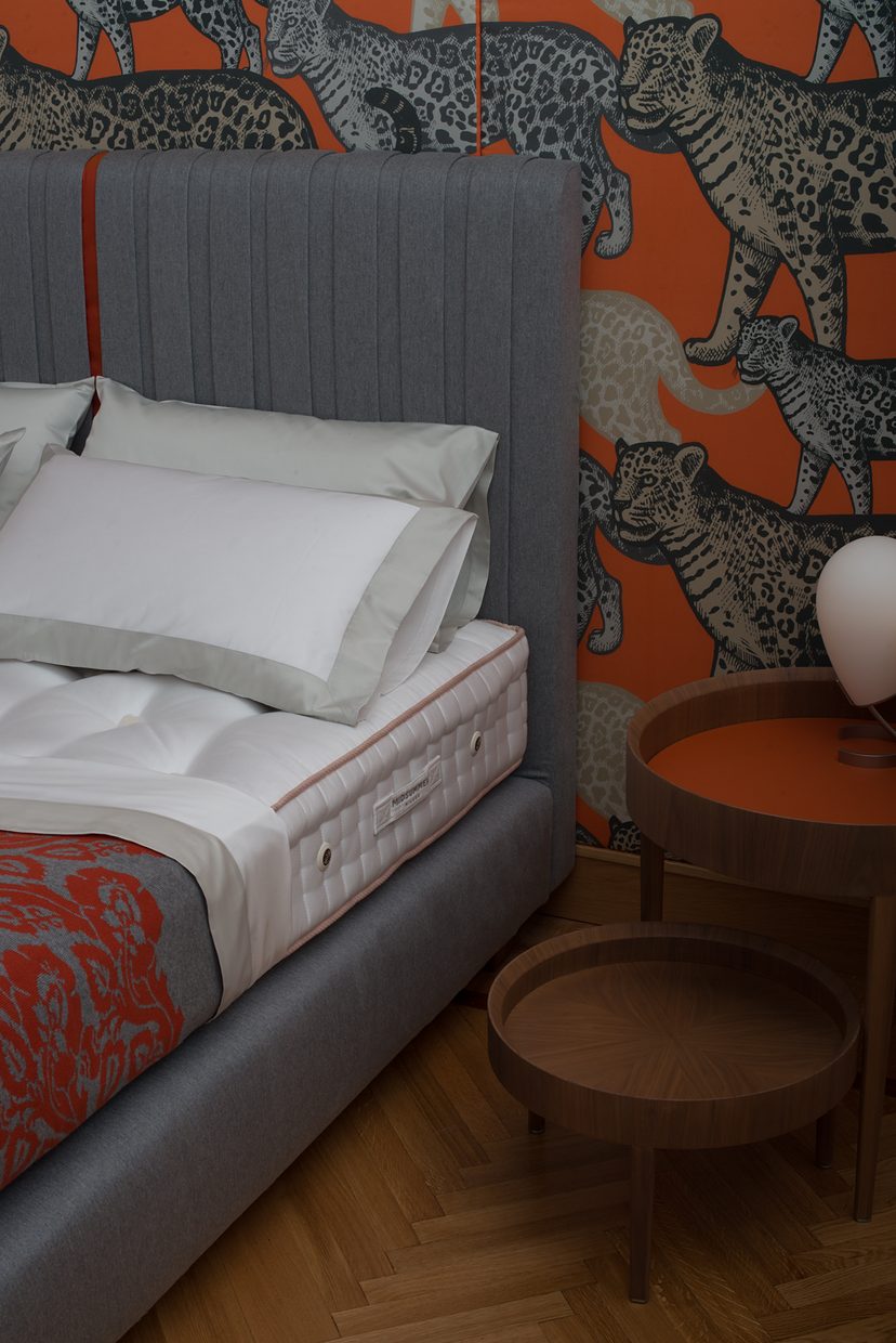 The leopard room, a bed made up for the night.